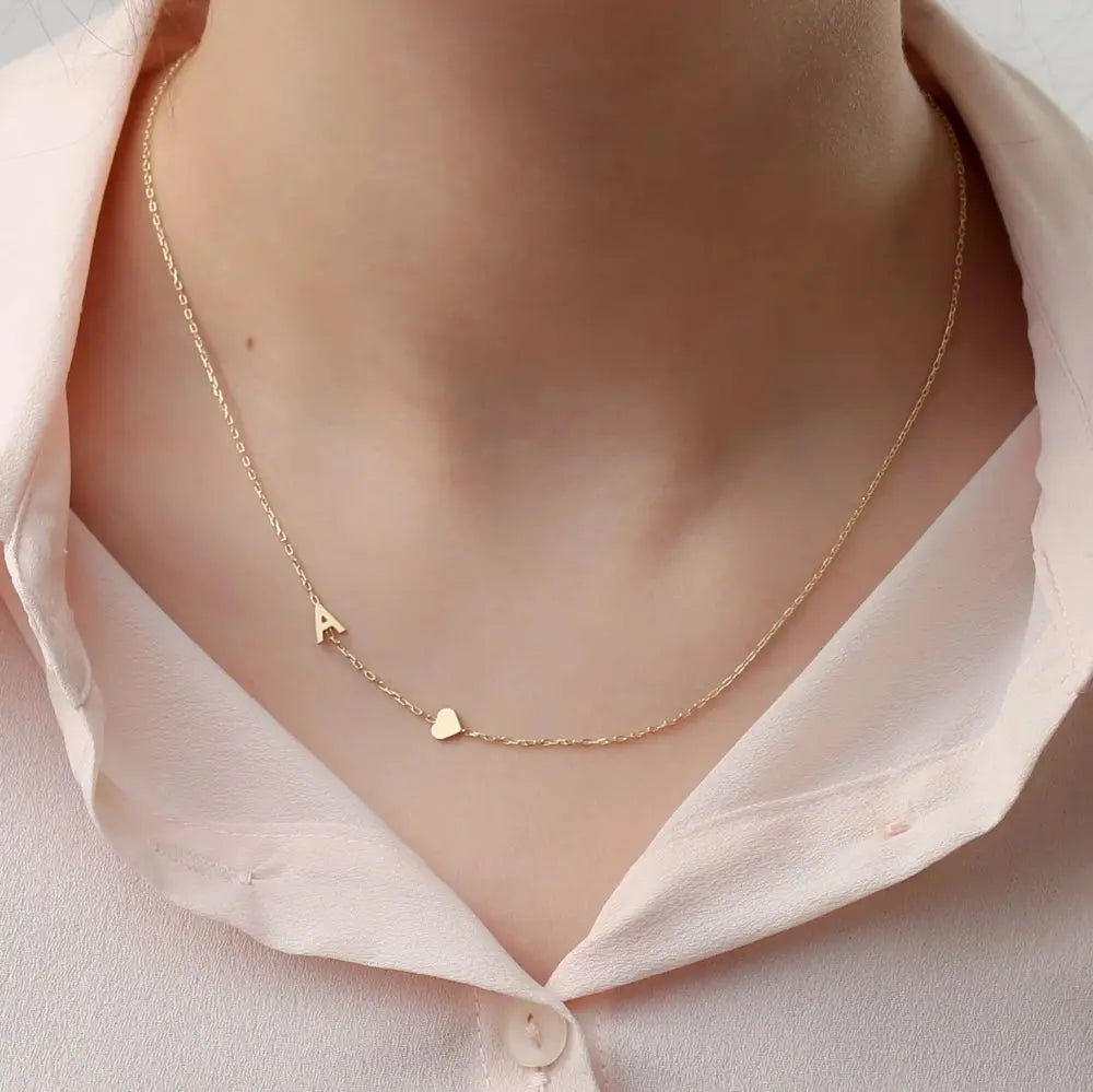 Custom sideways initial necklace in gold-plated stainless steel — minimalist monogram jewelry