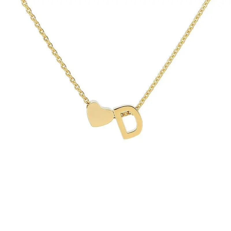 Heart pendant styled with everyday outfit — dainty stainless steel romantic accessory