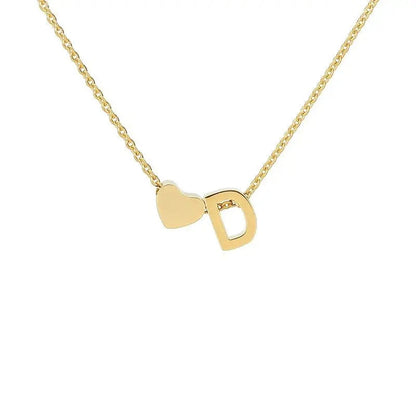 Heart pendant styled with everyday outfit — dainty stainless steel romantic accessory