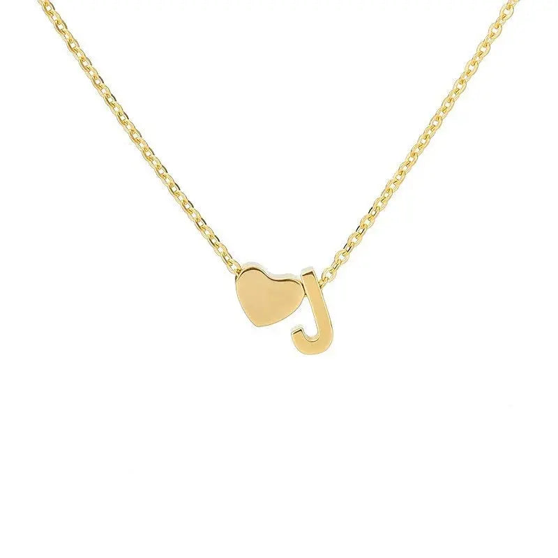 Heart necklace lifestyle shot on wedding outfit — bridesmaid gift personalized jewelry
