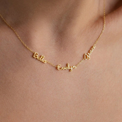 Dainty multiple name necklace with three names in delicate cursive — personalized family keepsake