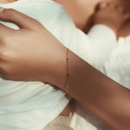 Sideways initial bracelet adjustable chain detail — comfortable daily wear personalized jewelry