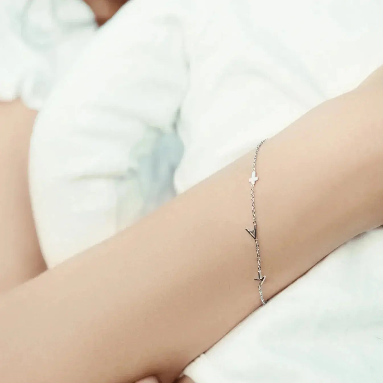 Sideways letter bracelet packaged for gift giving — Mother's Day or anniversary keepsake