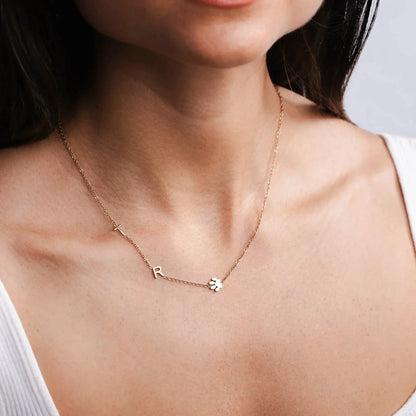 Multiple sideways initial necklaces layered — personalized monogram for family members